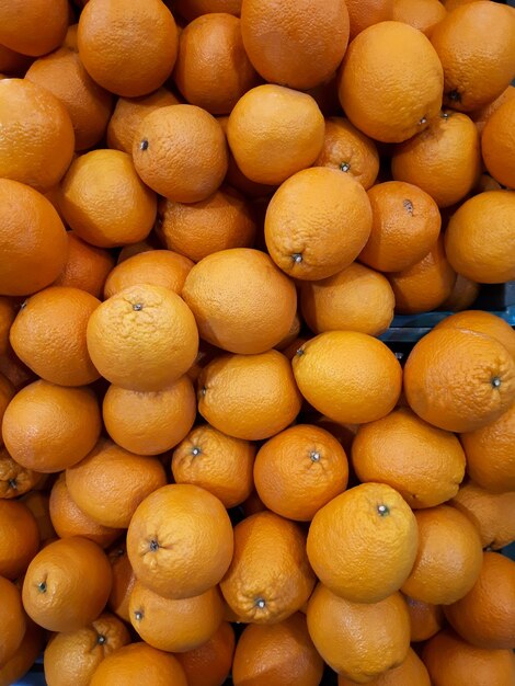 Photo une photo complète d'oranges sur le marché