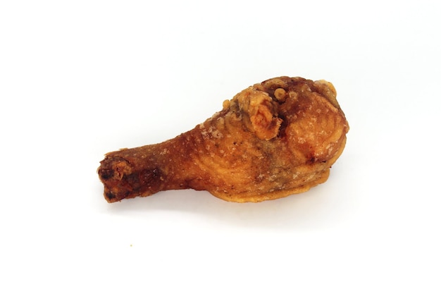 Photo de cuisse de poulet frit sur fond blanc