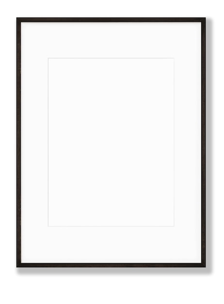 Une photo encadrée sur un mur blanc avec un cadre en bois sombre.
