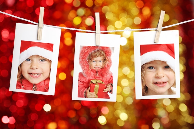 Photo photo d'enfant sur fond de lumières de noël