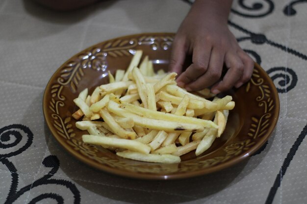 Photo de frites dans une assiette