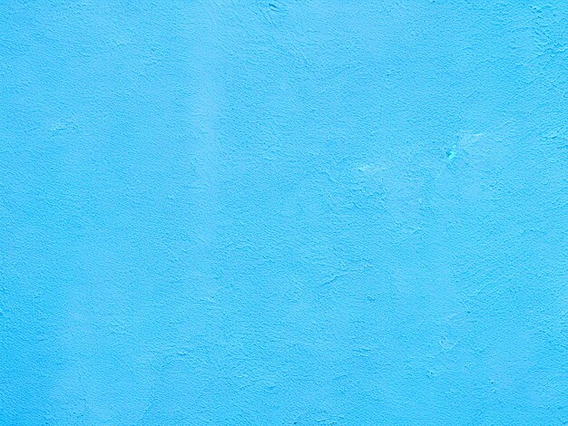 Photo gratuite texture de fond de mur de peinture bleue