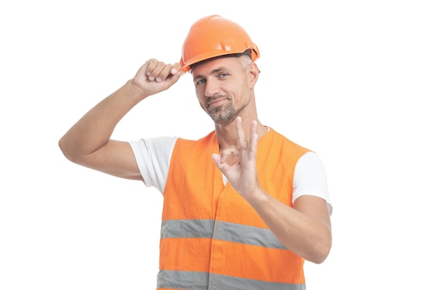 Photo d'un homme ouvrier portant un gilet réfléchissant ok homme ouvrier isolé sur blanc
