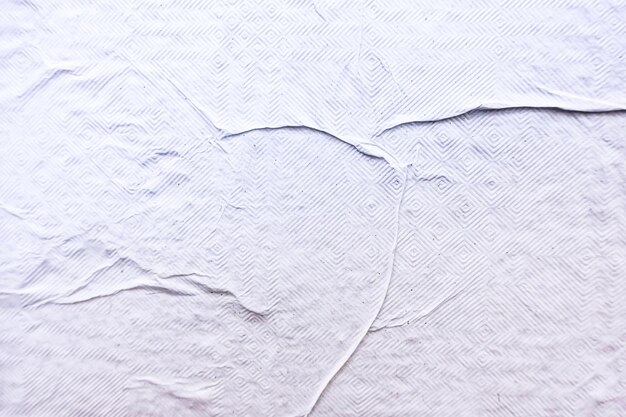 Une photo en plein cadre de papier peint blanc à motifs