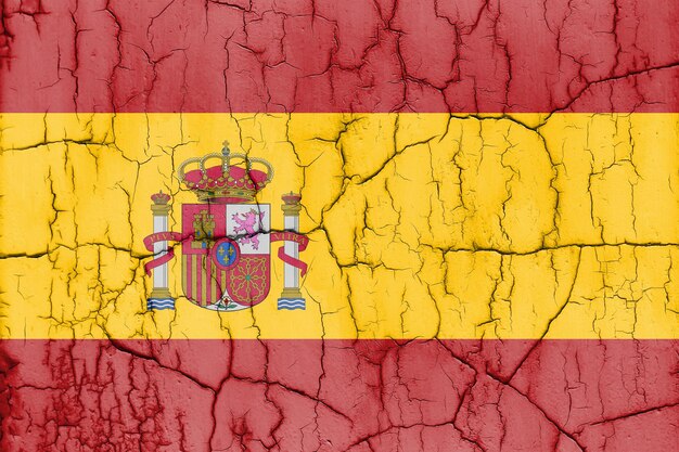 Photo texturée du drapeau de l'Espagne avec des fissures