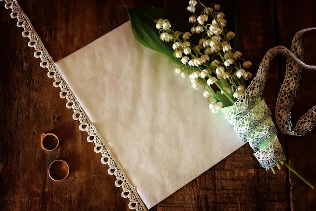 Photo vintage Bouquet de mariée de muguet et bague