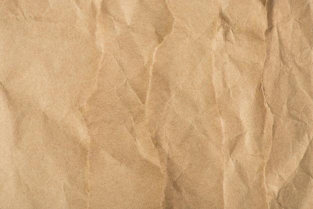 Photo vue de dessus de fond de papier kraft froissé isolé avec fond