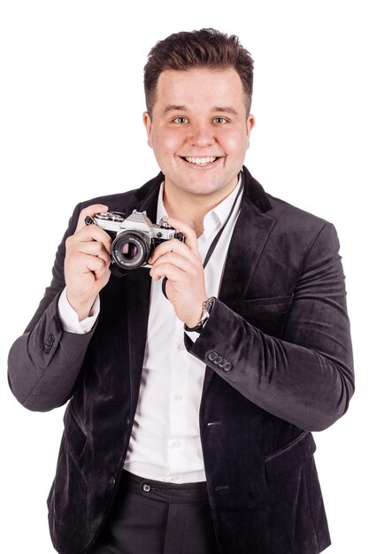 Photographe avec ancien appareil photo argentique rétro isolé sur fond blanc