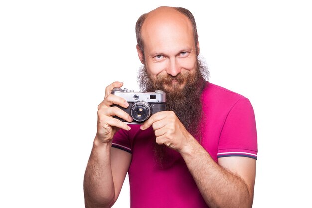 Photographe avec caméra tourné en studio