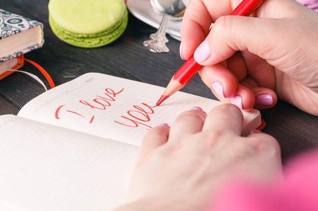 Phrase d'amour écrite dans un cahier