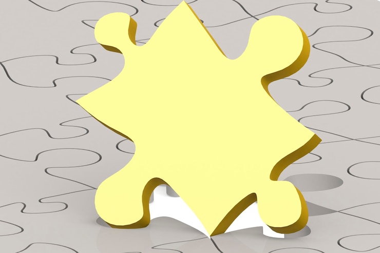 Photo pièce de puzzle dorée mise en évidence