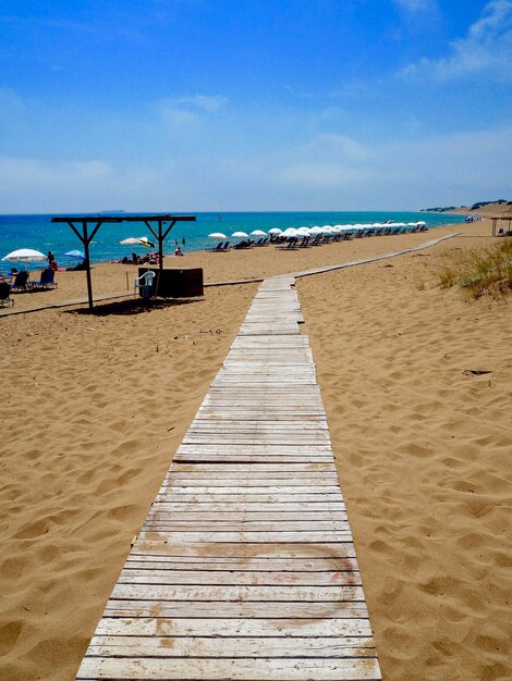 Photo pier sur la mer contre le ciel