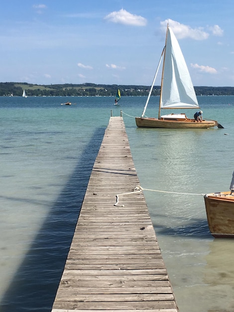 Photo pier sur la mer contre le ciel