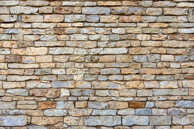 Pierre d'ardoise et fond de texture de mur de briques du bâtiment ou de la clôture