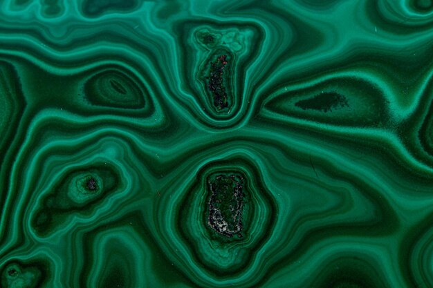 Pierre minérale macro Malachite sur fond blanc