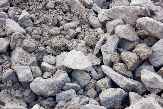 Les pierres, les déchets, les pavés de pierre naturelle, les pierres éclaboussées