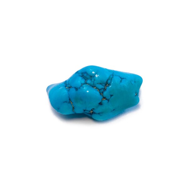 Pierres précieuses turquoise bijou en forme de coeur sur fond noir groupe d'objets