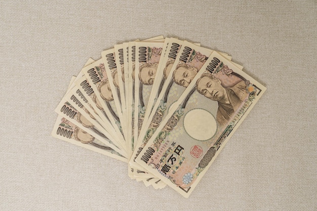 Pile de billets en yens japonais Mille Yen argent Japon trésorerie Récession fiscale Inflation de l'économie Financement des investissements et concepts de paiement des achats