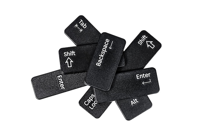 Pile de boutons de clavier sur fond blanc