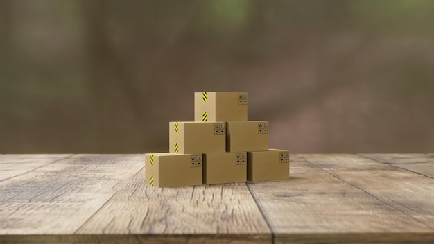 Une pile de cartons sur une table en bois.