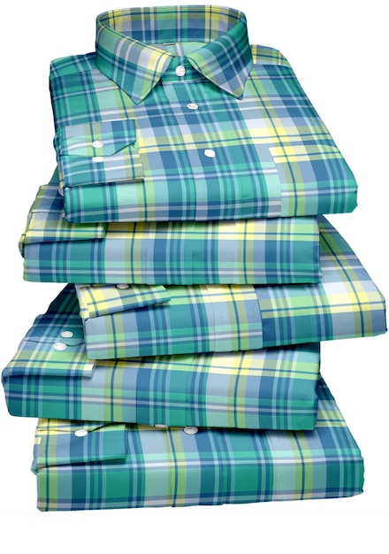 Photo une pile de chemises à carreaux bleues et vertes avec les mots 