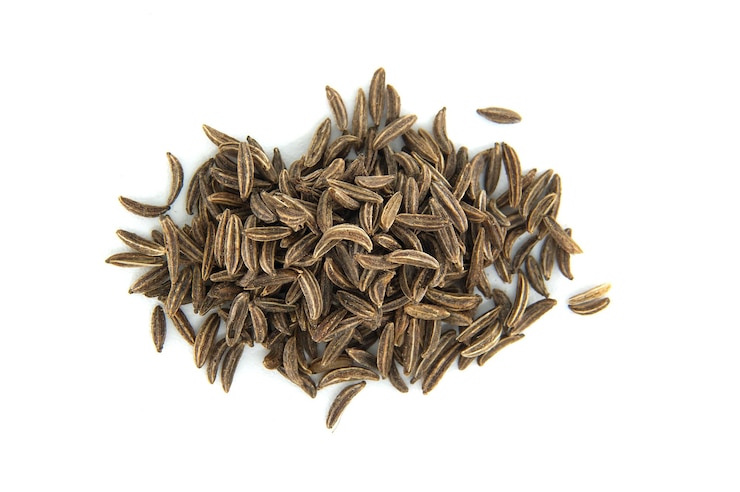 Photo une pile de graines de carambole créant une composition culinaire sur fond blanc