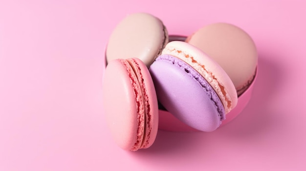 Une pile de macarons sur fond rose