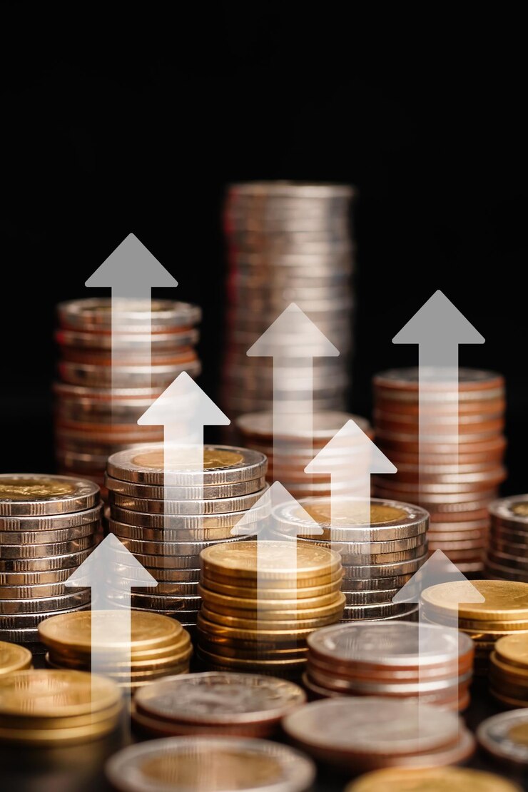 pile de pièces et graphique visuel de flèche dans les concepts financiers et le stock d'affaires d'investissement financier