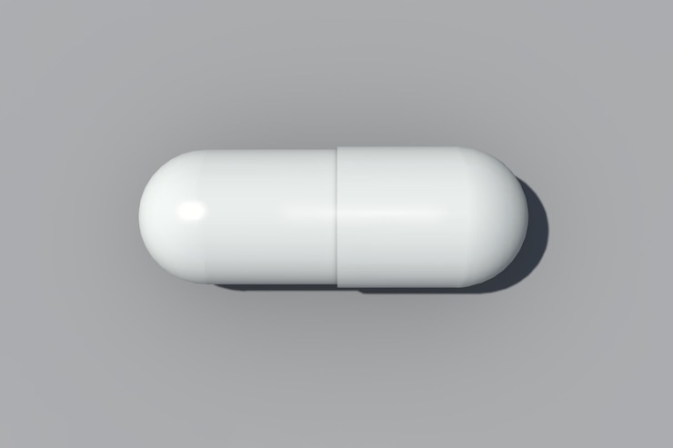 Photo pilule capsule blanche sur gros plan gris maquette espace de copie réaliste rendu 3d