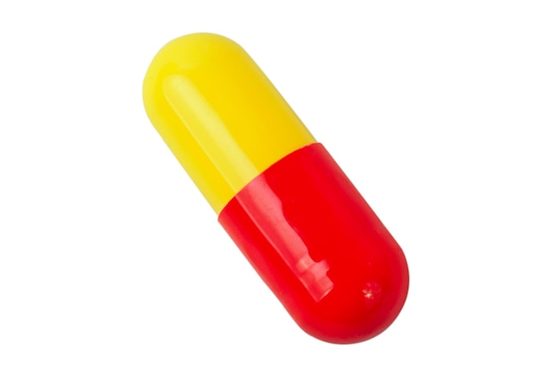 Une pilule médicale rouge-jaune