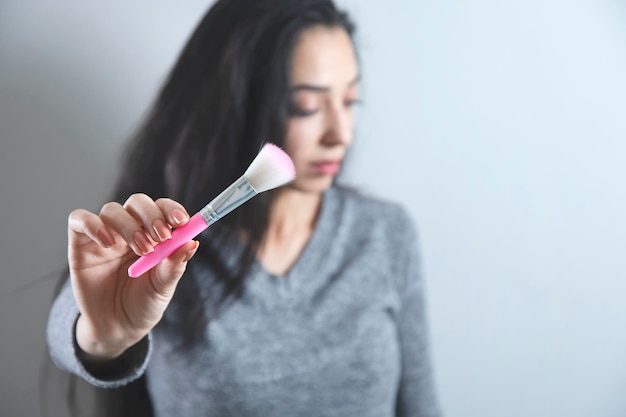 Pinceau de maquillage pour les mains de femme