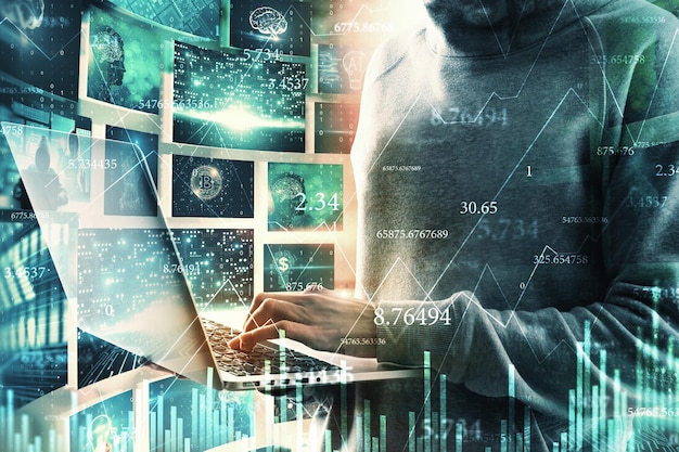 Pirate informatique méconnaissable utilisant un ordinateur portable avec une interface d'image d'entreprise numérique abstraite Innovation et concept multimédia Double exposition