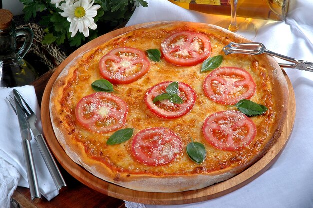 Pizza Margherita à base de Tomates, Mozzarella