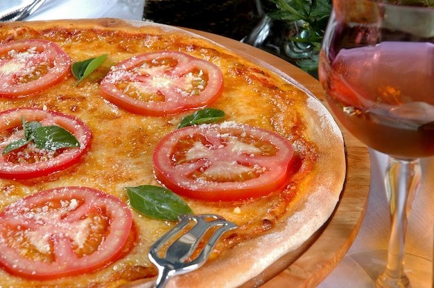 Pizza Margherita à base de Tomates, Mozzarella
