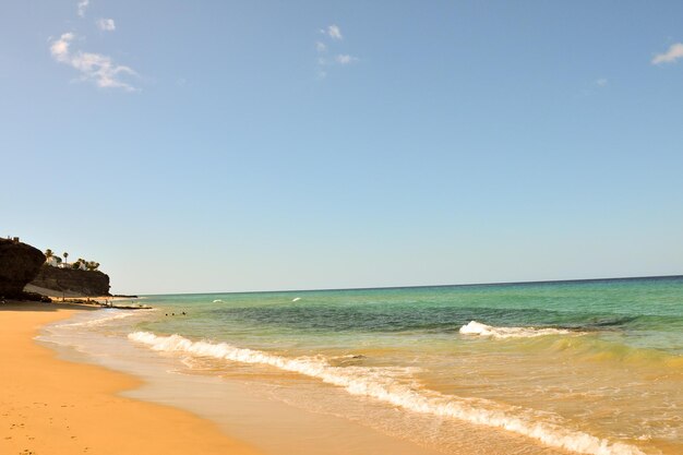 Photo la plage de sable de l'océan