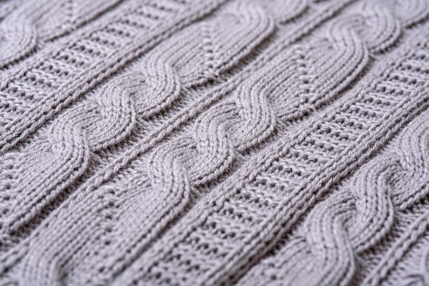 Plaid tricoté gris avec tricot à motifs