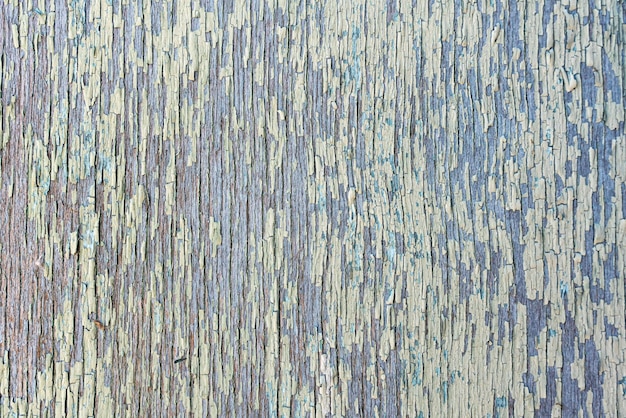 Planche de bois verticale clôture texture vieux fissures de peinture