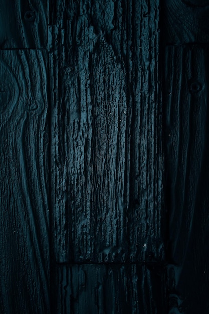 Planche texturée noire Fond de surface en bois Photo verticale Vue de dessus