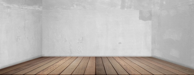 Plancher de bois et mur de ciment, salle vide