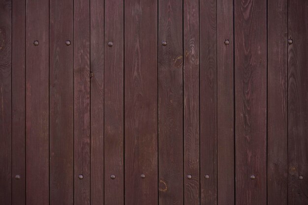 Planches en bois marron avec rivets