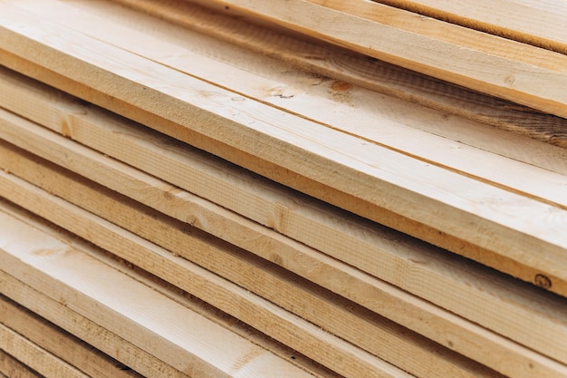 Photo planches en bois pour construire une maison en arrière-plan