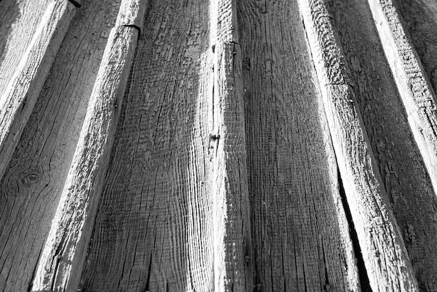 Les planches de bois regardent avec perspective Image en noir et blanc d'arrière-plan