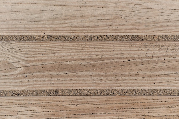 Planches de bois et sable de plage avec espace de copie