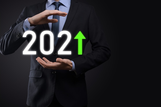 Planifier une croissance positive de l'entreprise dans le concept de l'année 2021. Plan d'affaires et augmentation des indicateurs positifs dans son entreprise, Grandir des concepts d'entreprise.