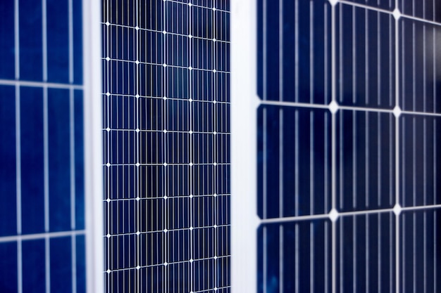 Plaque de panneau d'énergie solaire texture à carreaux bleu concept d'énergie écologique vert