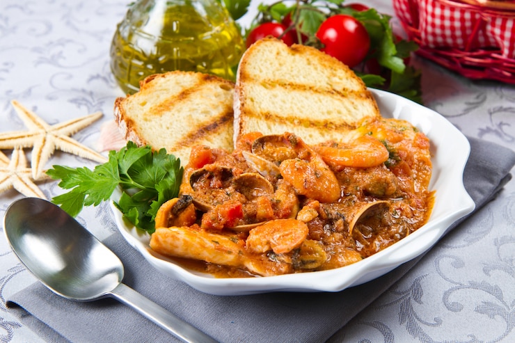 Photo plat avec du poisson et du pain