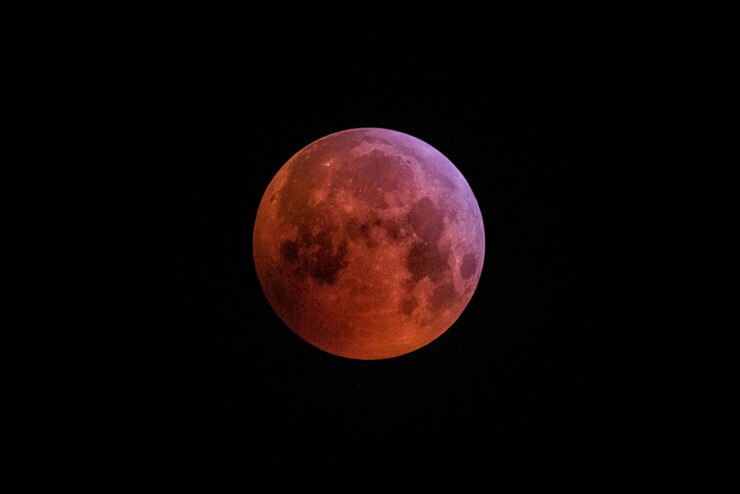 Photo pleine lune rousse