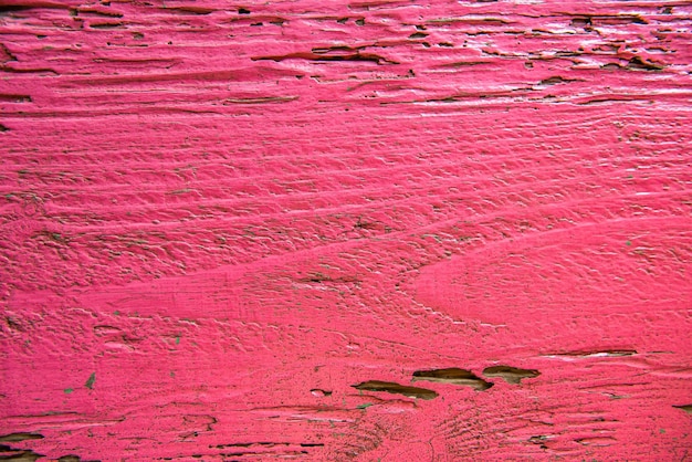 Plusieurs planches de bois peintes en rose Maisons de poutres en bois dans les Caraïbes