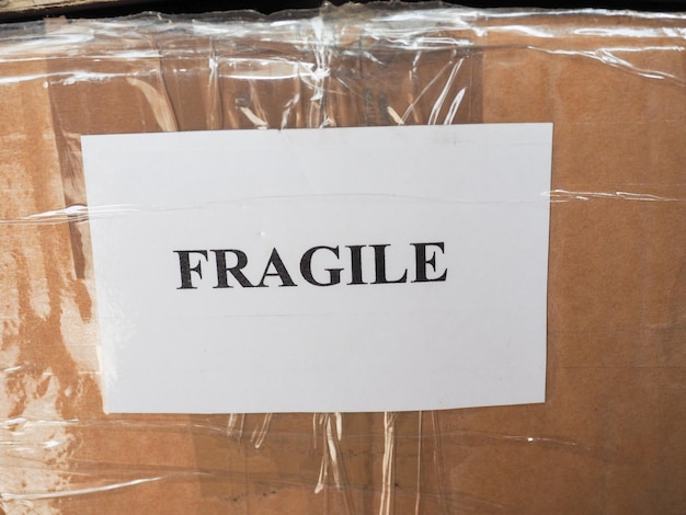 Poignée fragile avec signe de soin