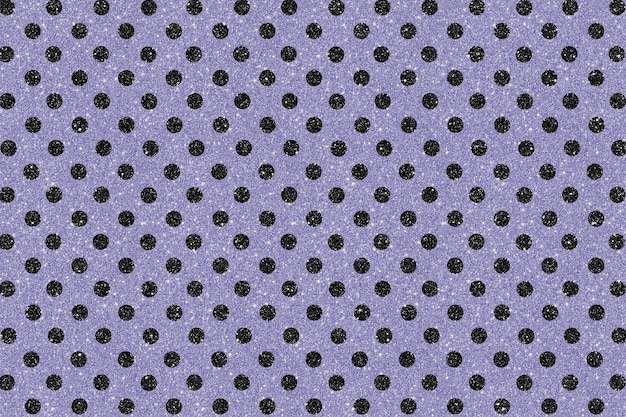 Des points en demi-ton sur un fond noir et violet.